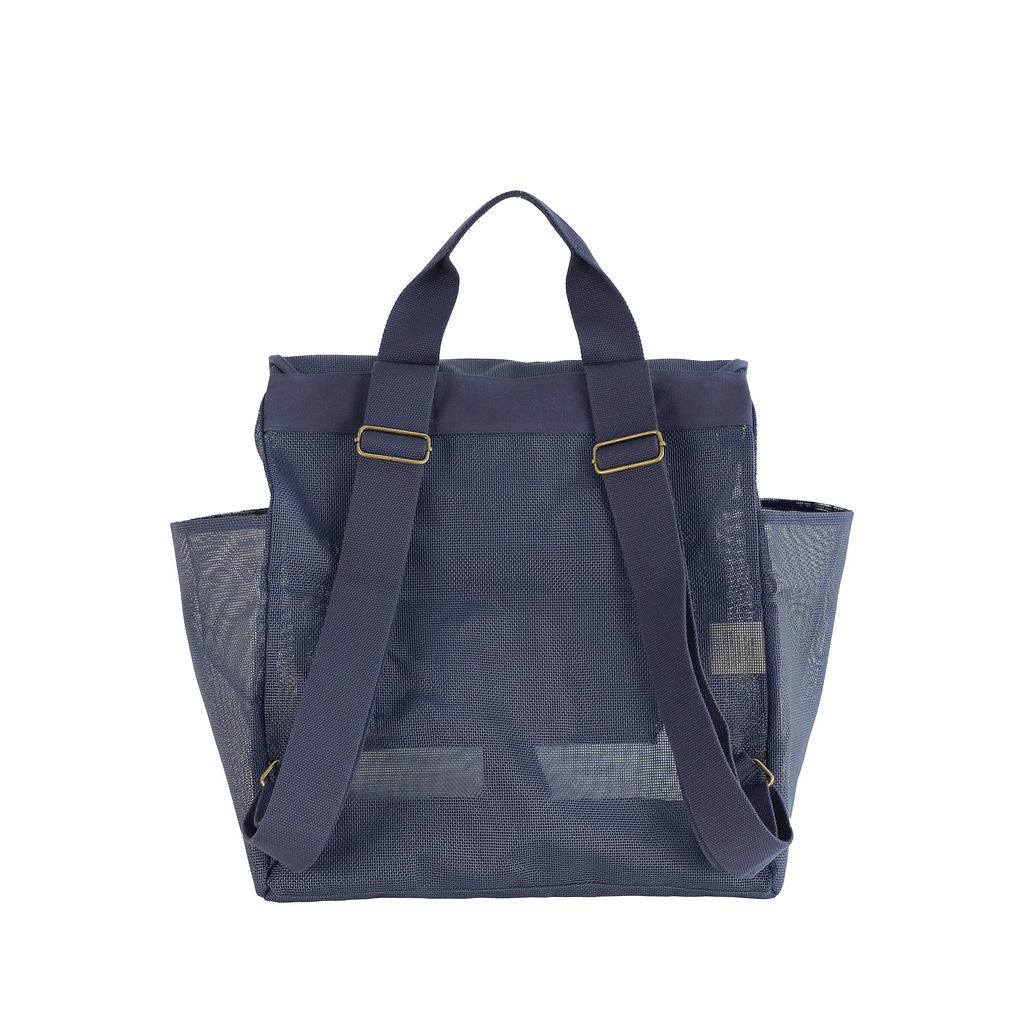 This studio image shows the Sande Kids™ Beach Hauler mesh backpack in Deep Sea Navy from the rear view. The image highlights the adjustable backpack straps for a customized fit, thick cotton canvas for comfortable carrying, and sturdy mesh material, ensuring durability and practicality for everyday use.