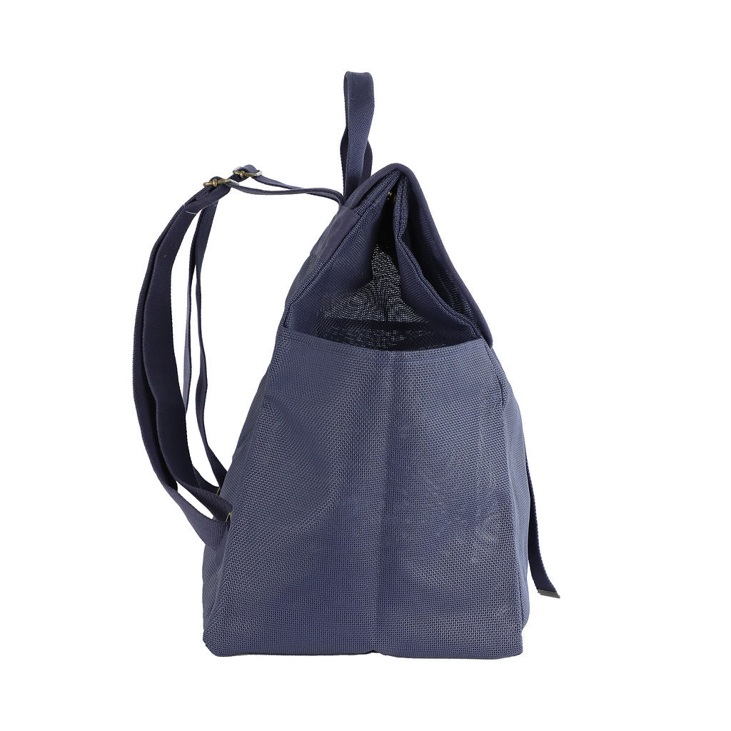 This studio image shows the Sande Kids™ Beach Hauler mesh backpack in Deep Sea Navy from the side view. The image highlights the adjustable straps for a comfortable fit, a side mesh pocket for easy storage, and the sleek design of the bag, making it both practical and stylish.