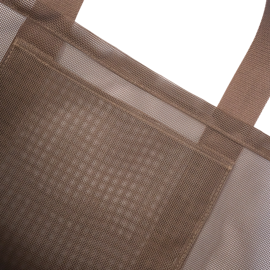 Close-up image of the Sande™ Beach Hauler oversized mesh bag in Espresso Brown, showing the large internal mesh pocket for staying organised. The compact, durable mesh bag is ideal for carrying beach essentials, market trips, and outdoor adventures.