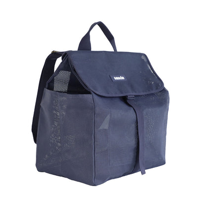 This studio image shows the Sande Kids™ Beach Hauler mesh backpack in Deep Sea Navy at a 45-degree angle. The front view highlights key features, including a top carry handle, two side mesh pockets, a flap with a clip for added security, and a silicone label with the Sande Kids™ logo in white.
